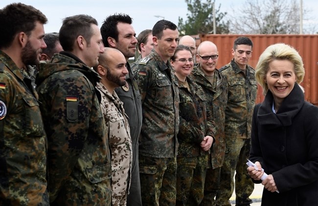 German Defense Minister Ursula von der Leyen chatting with soldiers during a visit of the German Armed Forces Bundeswehr