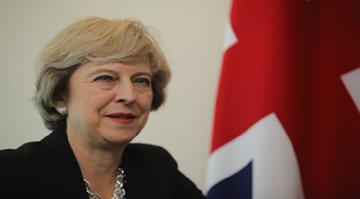 New British PM Calls for Tougher Stance on Migrants
