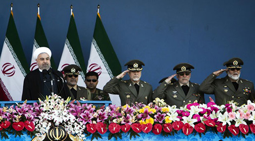 Iranian President Hassan Rouhani attends as army commander General Ataollah Salehi and commander of Iran's army