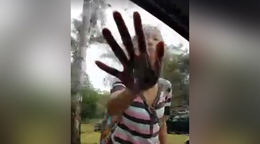 Woman chases Muslim woman with face veil 