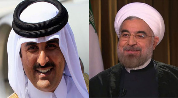 Iranian President Hassan Rouhani and Qatari Emir Sheikh Tamim bin Hamad Al Thani