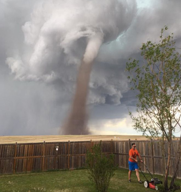 picture of lawn-mowing man 