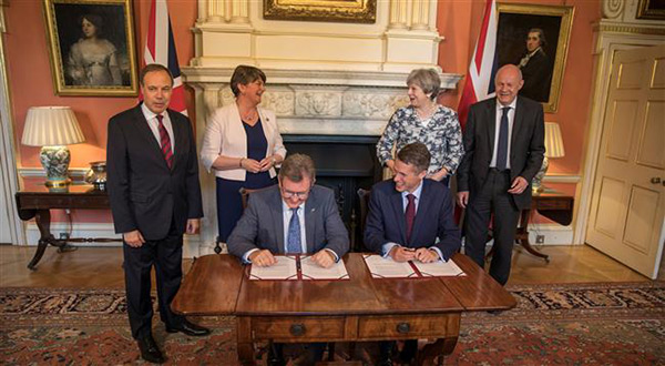 Theresa May’s £1bn DUP Deal Met with Outrage