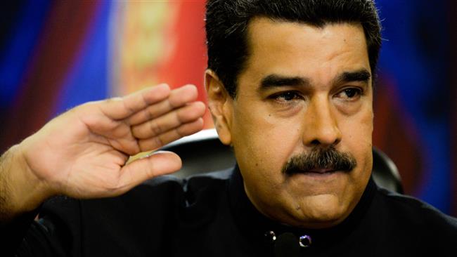 Venezuelan President Nicolas Maduro speaks during a press conference for foreign correspondents at the Miraflores presidential palace in Caracas