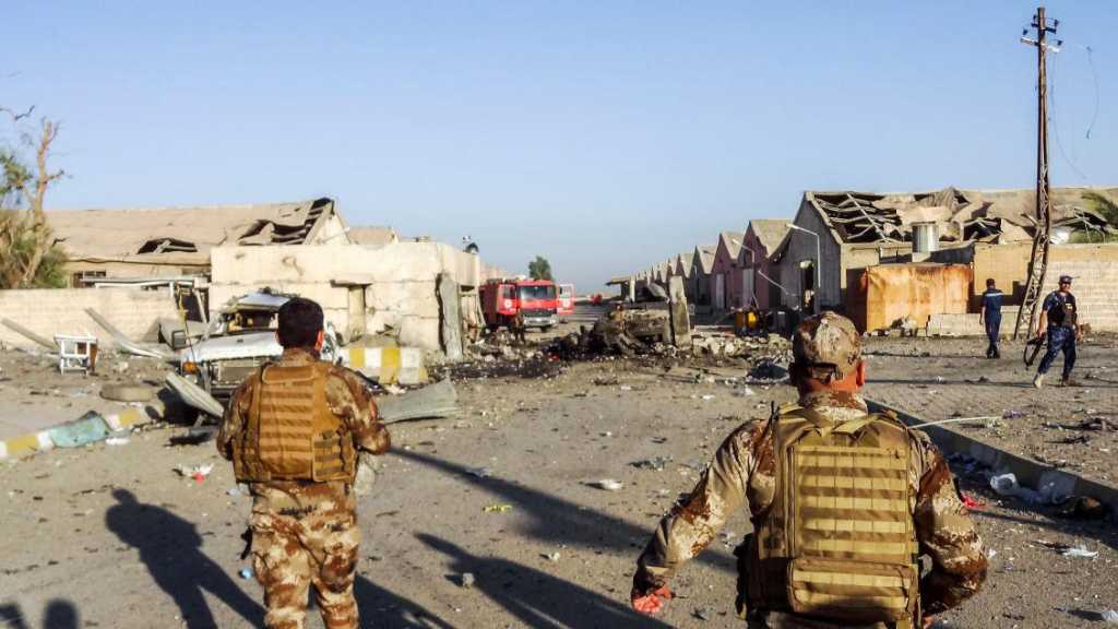 Suicide Bombing Wounds 19 at Iraq Ballot Warehouse