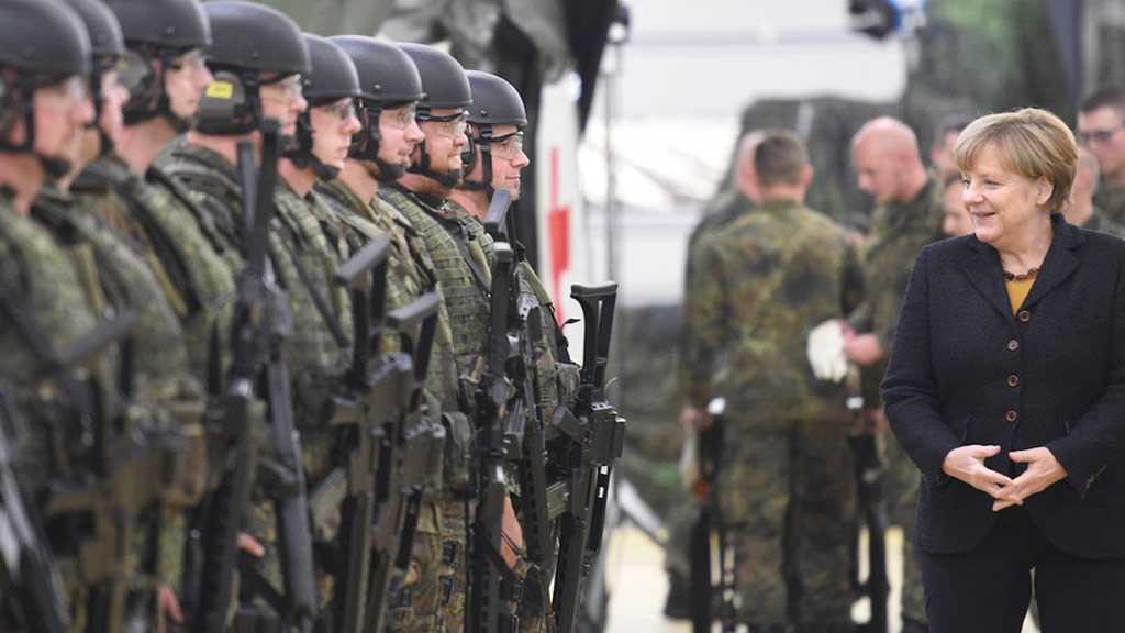 Merkel Agrees to Boost German Military Spending Amid Trump’s Pressure