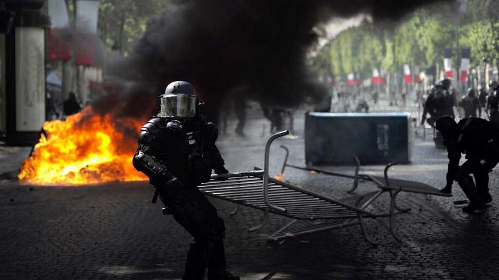 Paris Clashes Tarnish Macron’s Military Parade
