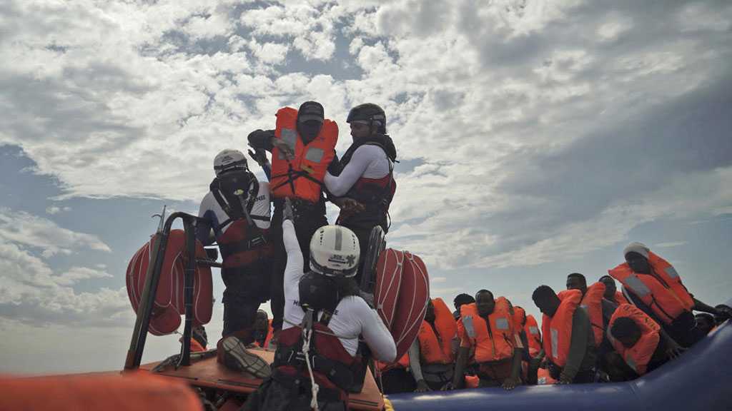 Rescue Boat with 82 Migrants Can Dock at Italian Isle