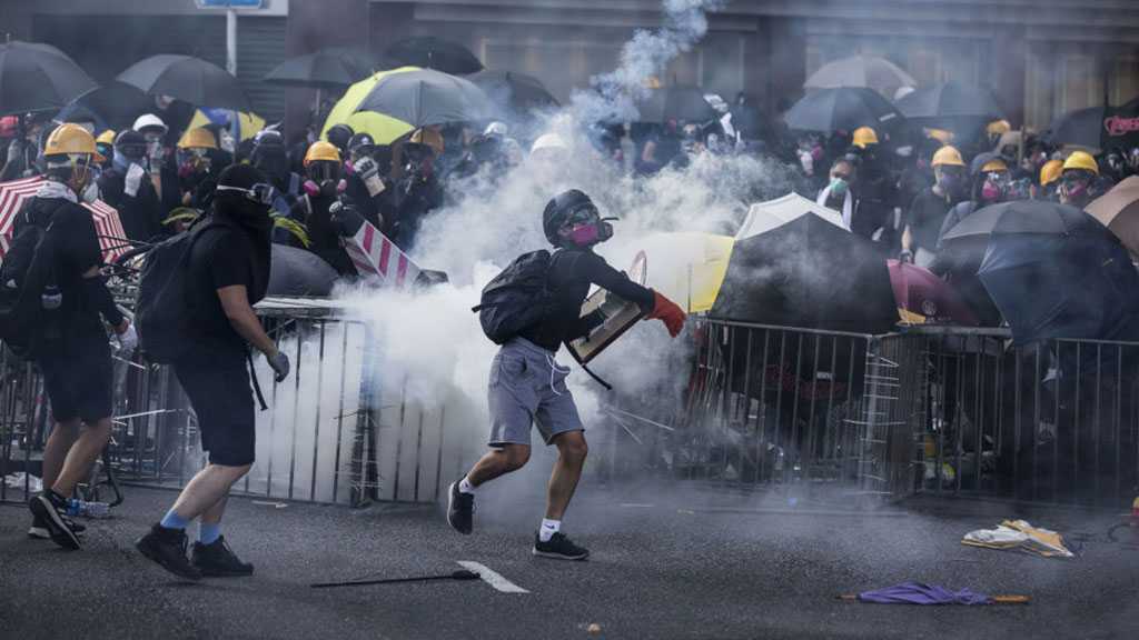 Urgent Evacuation Taking Place at Hong Kong Parliament Amid Protests