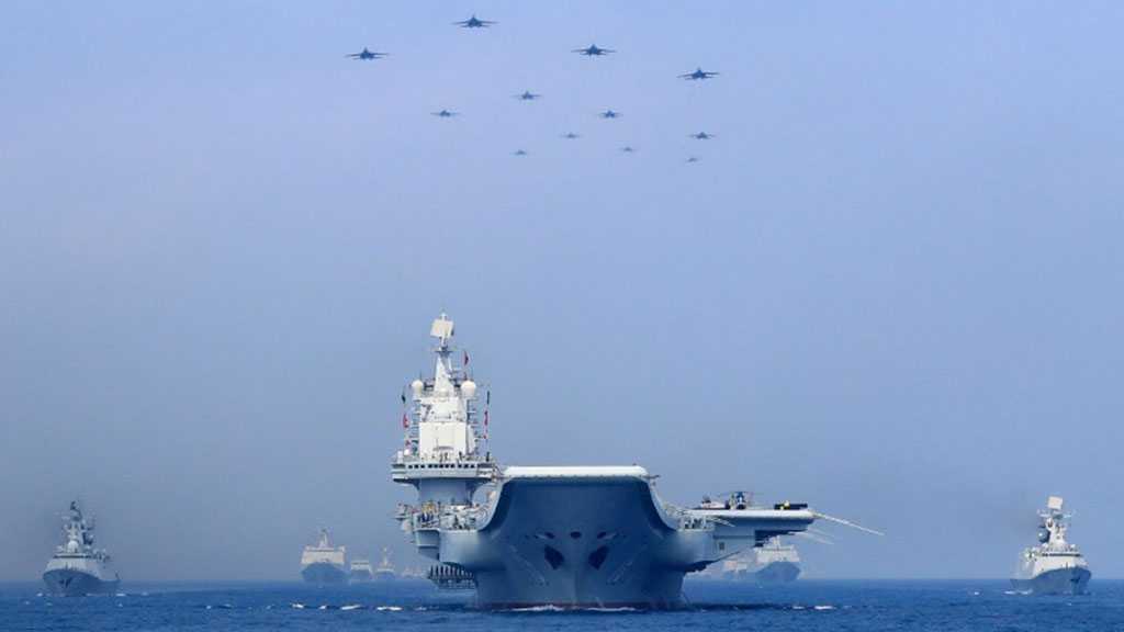 China Calls on US to «Stop Flexing Muscles» in S China Sea