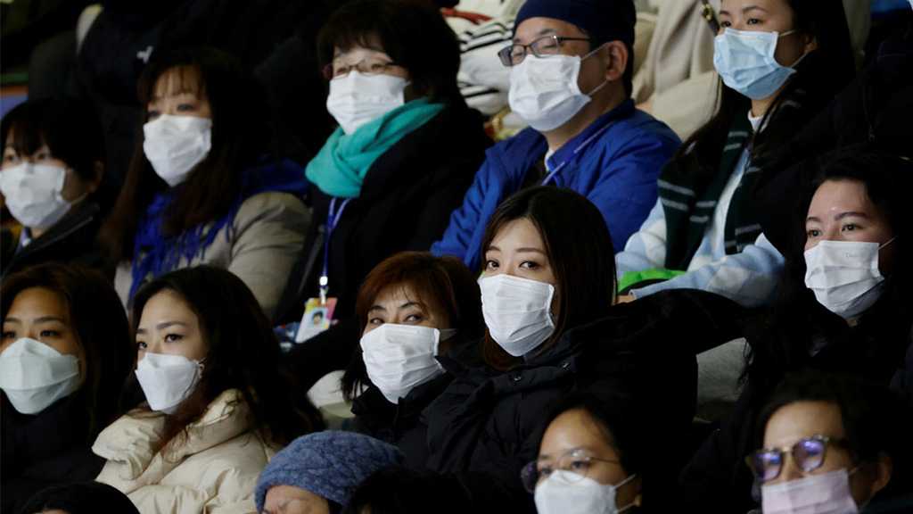 China’s New Coronavirus Toll Hits 722