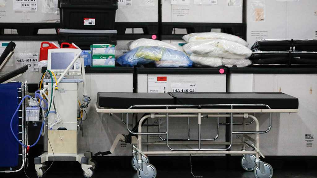 US Hospitals “Overwhelmed” as COVID-19 Cases Continue to Surge