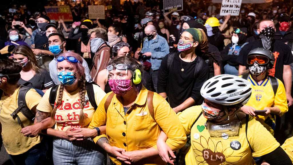“Wall of Moms” Forms Human Chain in Portland to Shield Protesters from Federal Police