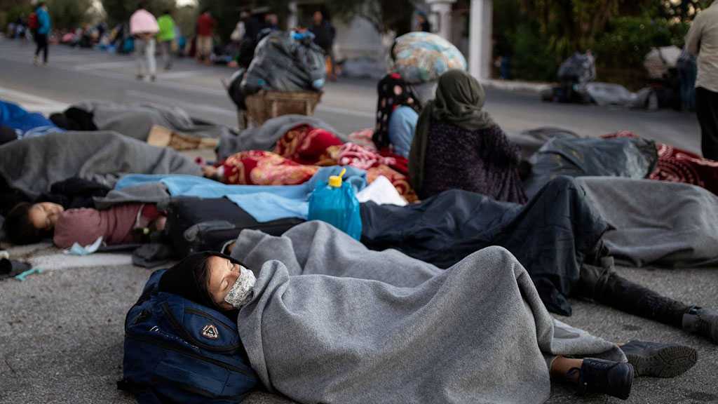 Hungry Refugees Sleep Rough on Lesbos Island after Moria Fire