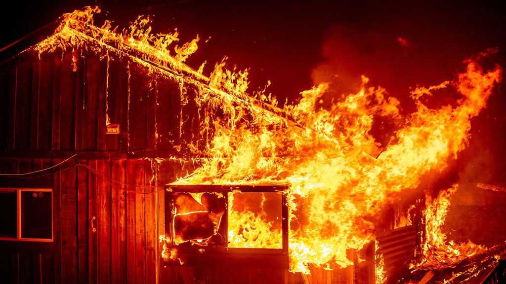 At Least 10 Dead In California As Wildfires Scorch the US West Coast