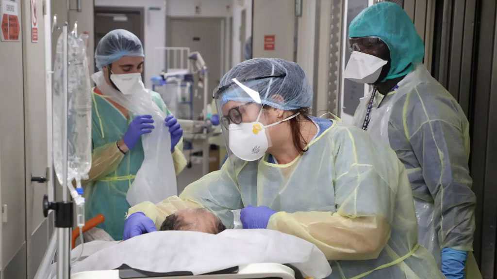 COVID-19 Cases Jump to New Daily Record Over 13,000 In France