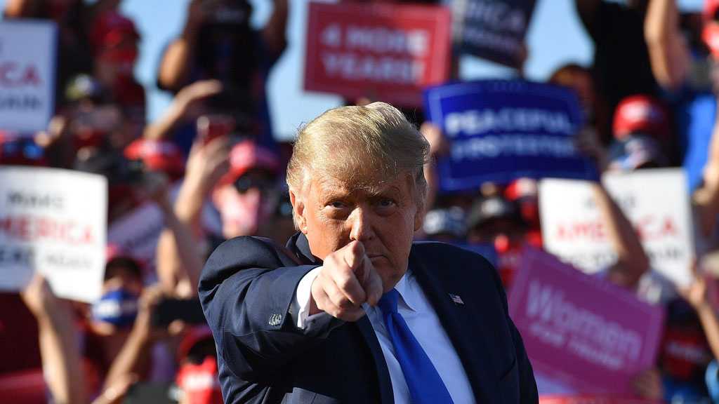 Trump Mocks Biden For Listening to Scientists as Rally Crowd Chant ‘Lock Him Up’