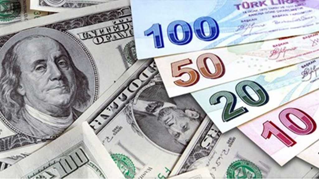 Turkish Lira Slides to Record Low of 8 against Dollar