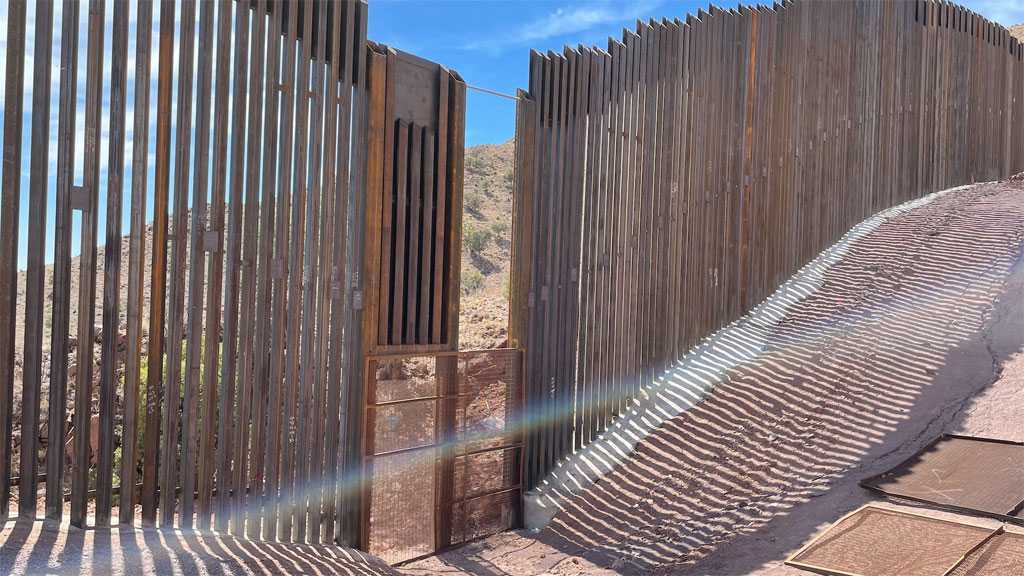 ’Legions of Migrants’ Using Border Wall’s Unfinished Sections to Enter US