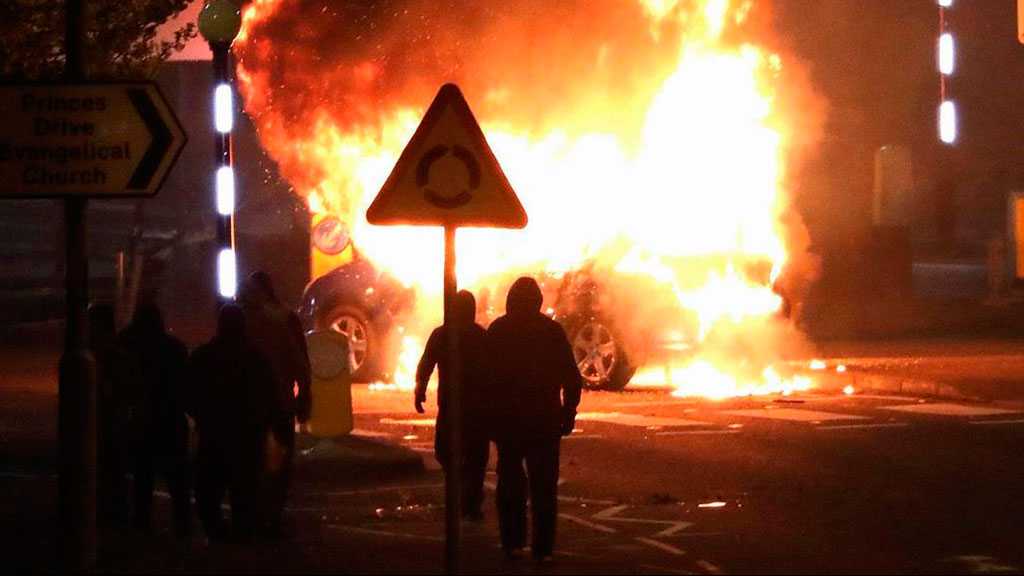 Burning Car Rams into Police Line as Nightly Rioting Continues in Belfast