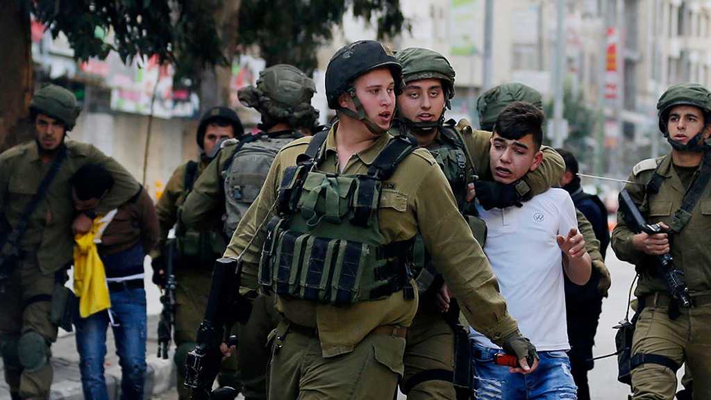 “Israeli” Forces Arrest 18 Palestinians in Raids across WB