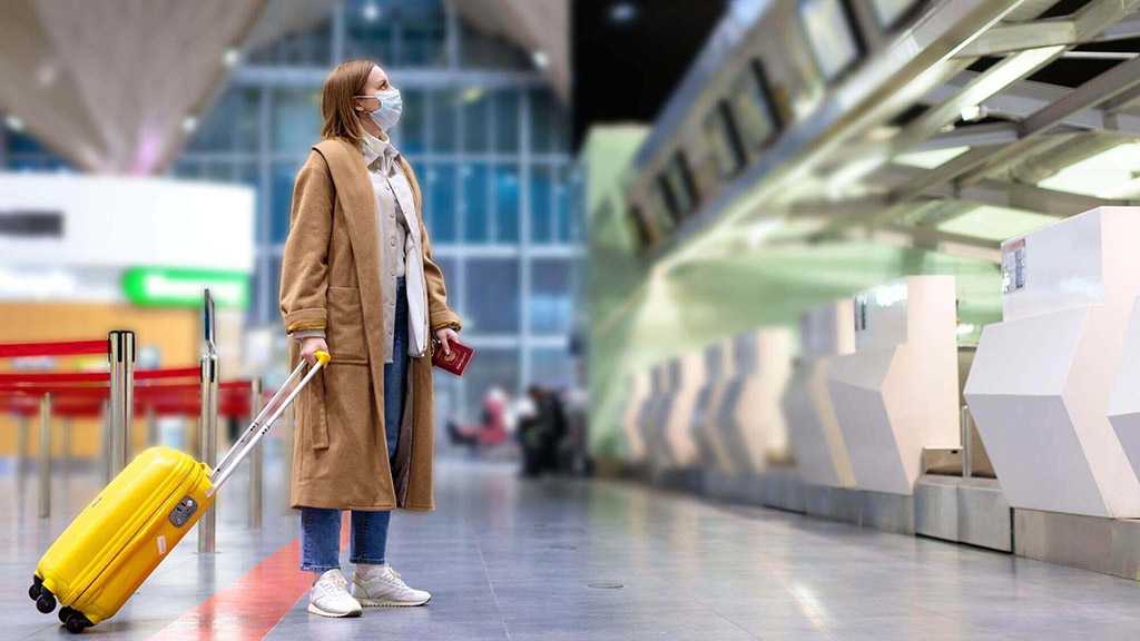 WHO Recommends Lifting COVID-19 Travel Restrictions over Inefficiency, Economic Harm