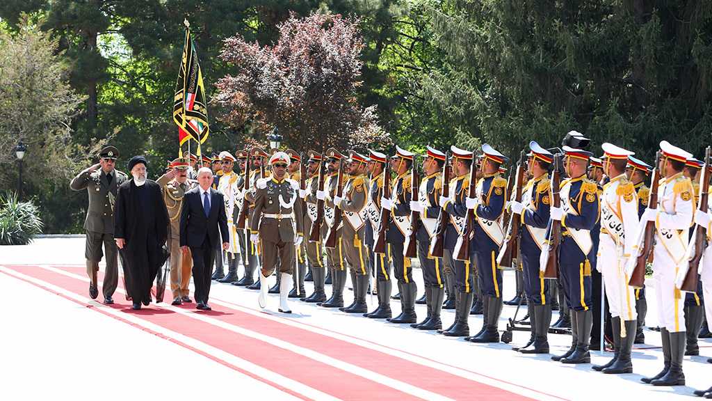 Iraq’s President Welcomed in Tehran By Raisi Leading A High-Ranking Delegation