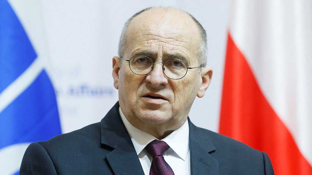 Warsaw: German Chancellor Meddling in Polish Elections