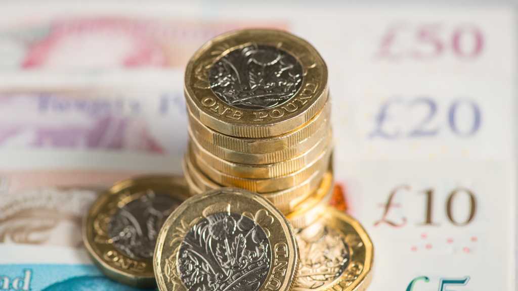 Britons Warned of Slip in Wage Growth