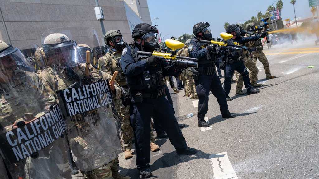 Trump Threatens to Invoke Insurrection Act Amid ’National Guard’ Deployment Showdown
